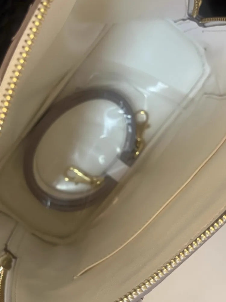 Snake-Pattern Dome Handbag