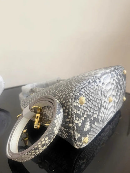 Snake-Pattern Dome Handbag
