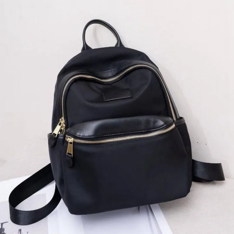 Curved-Zip Pocket Backpack