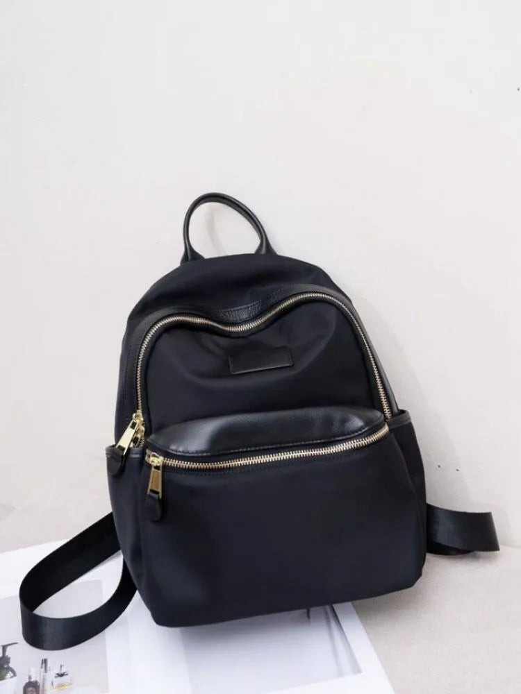 Curved-Zip Pocket Backpack