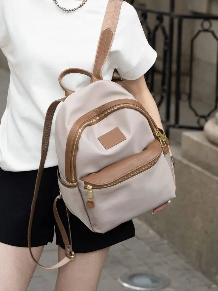 Curved-Zip Pocket Backpack