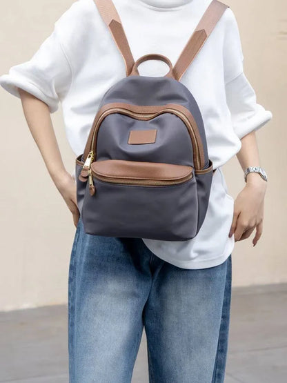 Curved-Zip Pocket Backpack