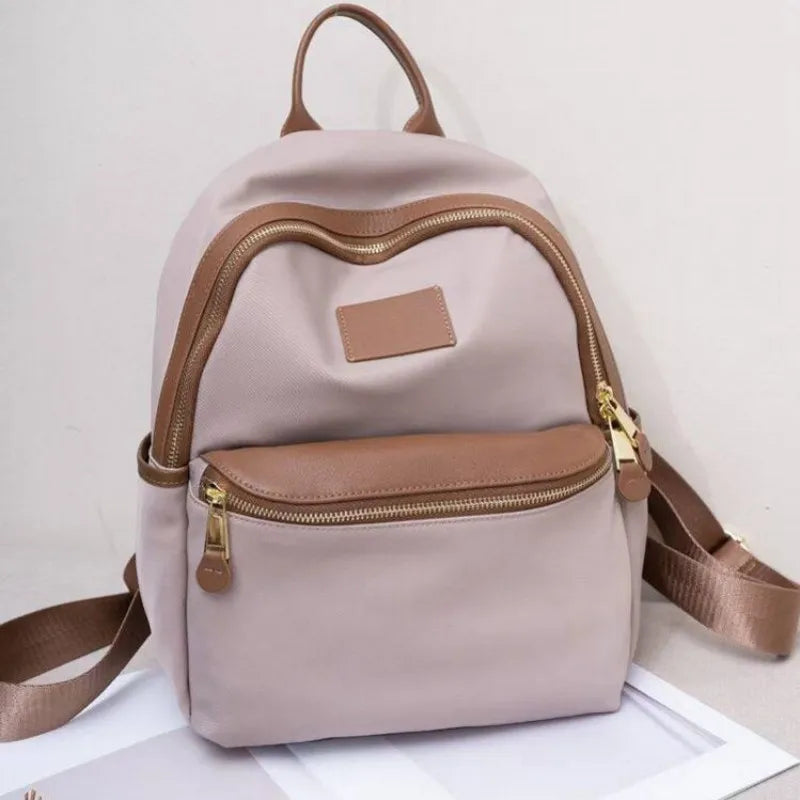 Curved-Zip Pocket Backpack